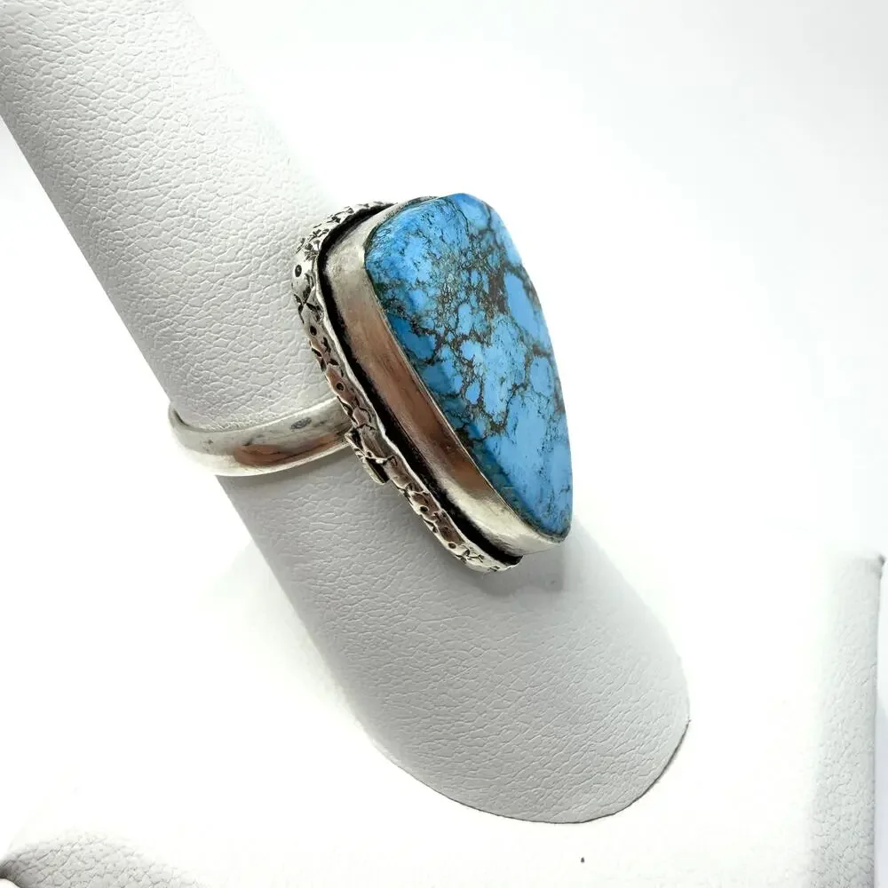 Turquoise gemstone, silver overlay ring stamped 925‎  oval adjustable 5-8